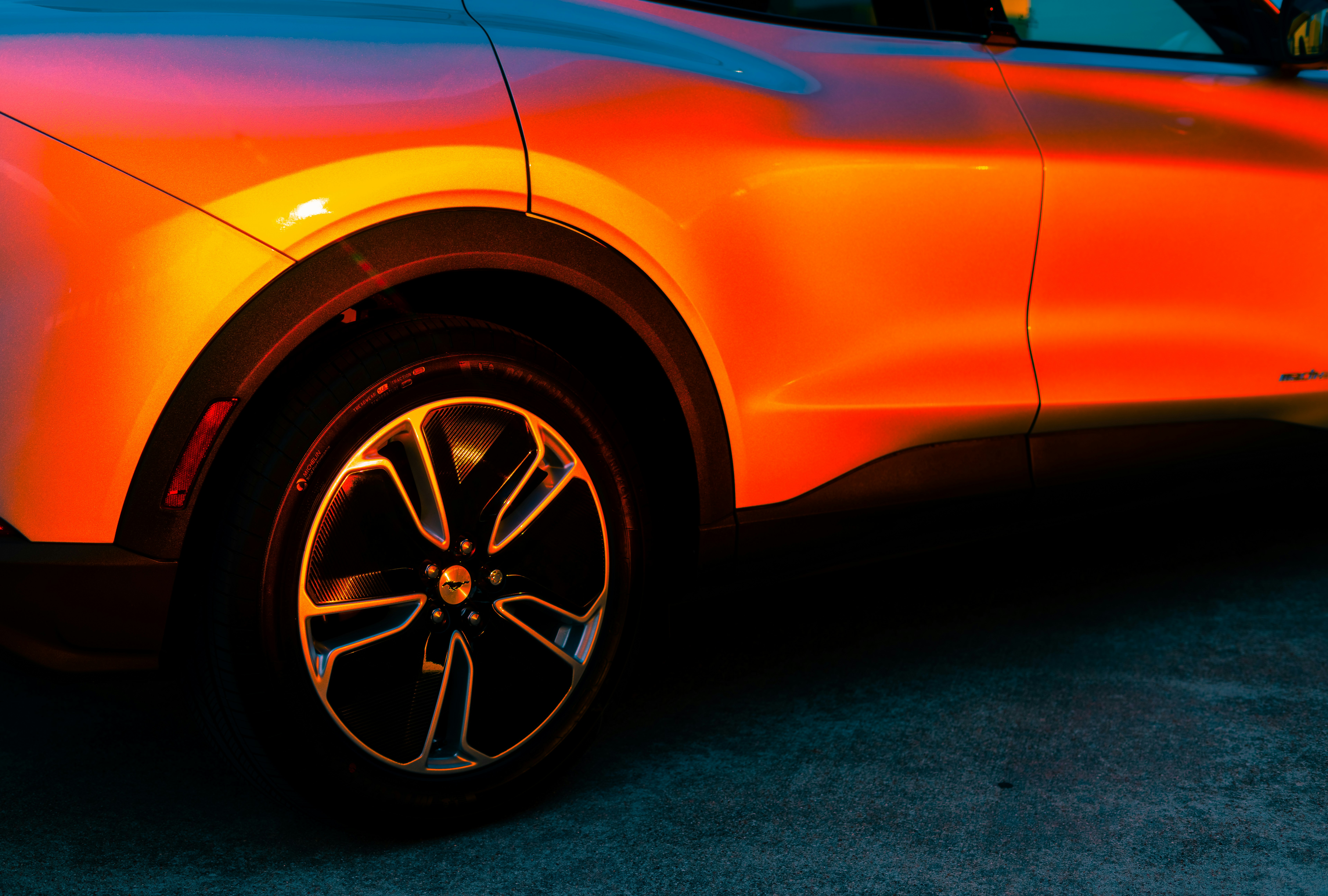 orange car with black wheel